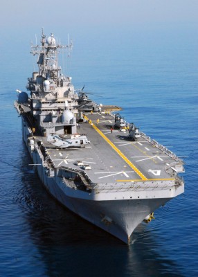 US_Navy_071119-N-3165S-029_The_amphibious_assault_ship_USS_Nassau_(LHA_4)_conducts_flight_deck_qualifications_with_the_air_combat_element_of_the_24th_Marine_Expeditionary_Unit_along_with_members_of_the_Helicopter_Sea_Combat_Squ.jpg