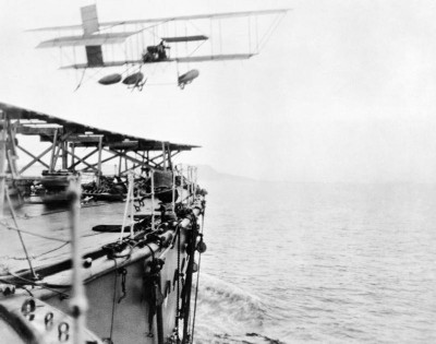 HMS_Hibernia_first_aircraft_takeoff_1912_IWM_Q_71041.jpg